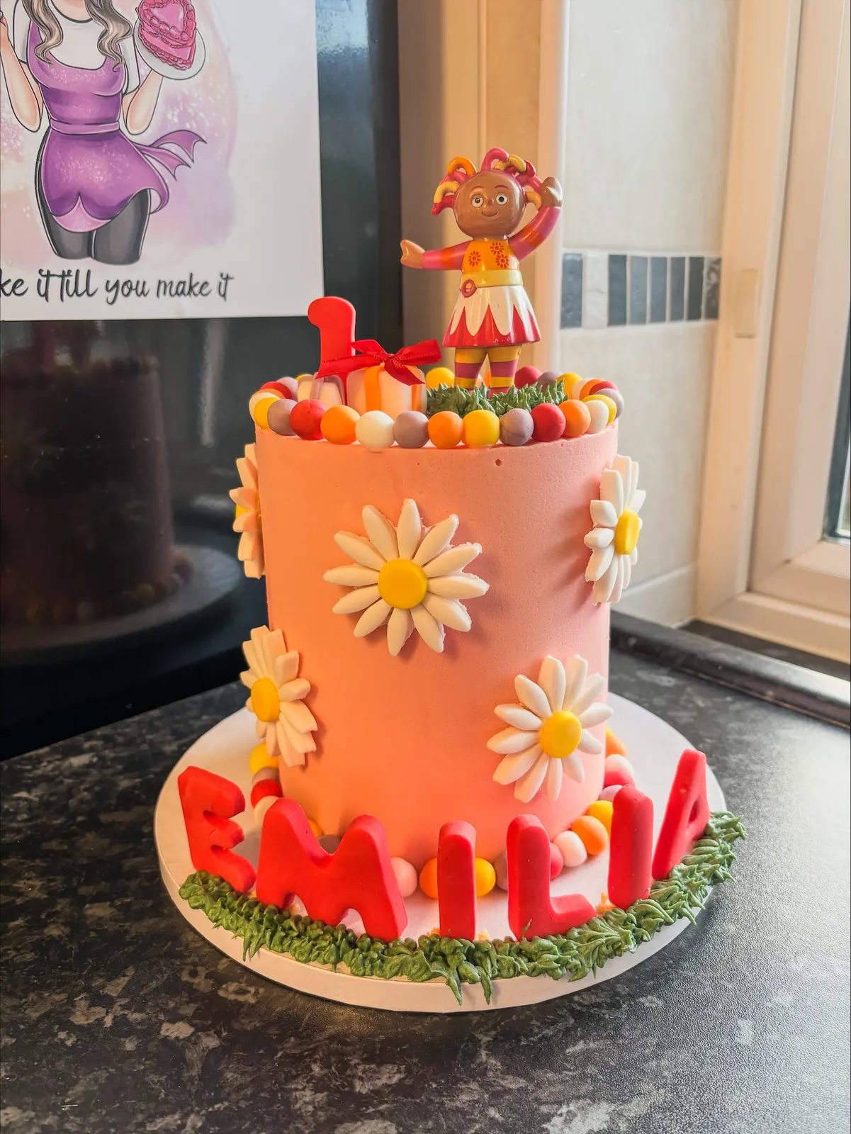 Pink daisy birthday cake